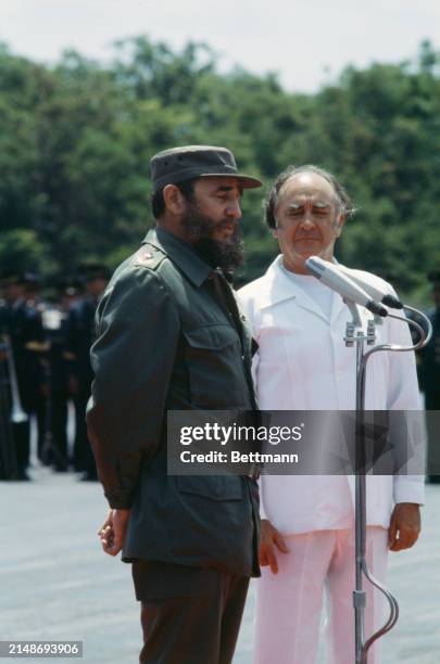 Mexican President Jose Lopez Portillo greets Cuban President Fidel Castro on arrival at Cozumel Airport in Mexico, May 17th 1979.