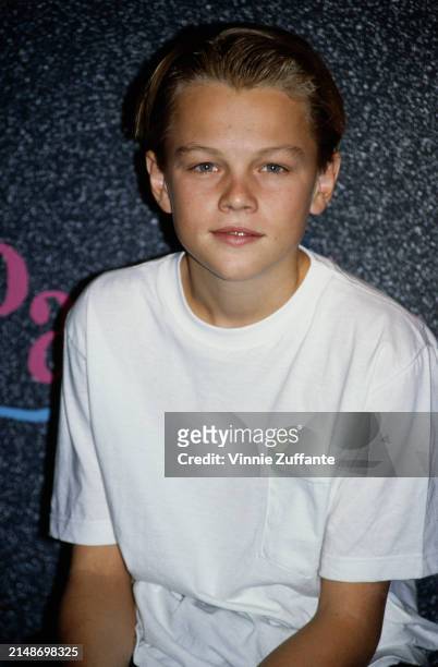 American actor Leonardo Di Caprio, wearing a white t-shirt at an NBC 'Up Front' press conference, in Los Angeles, California, 18th June 1990. The...