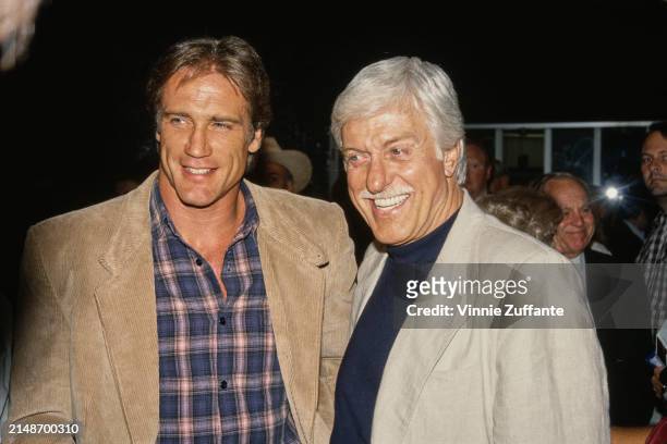 American actor Barry Van Dyke, wearing a beige corduroy jacket over a checked shirt, and his father, American actor and comedian Dick Van Dyke, who...