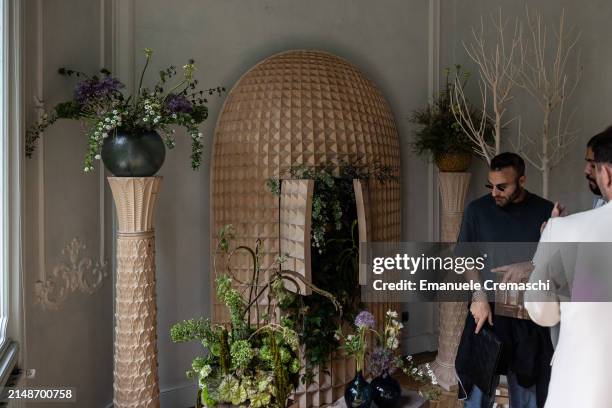 People visit the exhibition "L'Appartamento" by Artemest, located at Residenza Vignale, during the Milan Design Week 2024 on April 15, 2024 in Milan,...