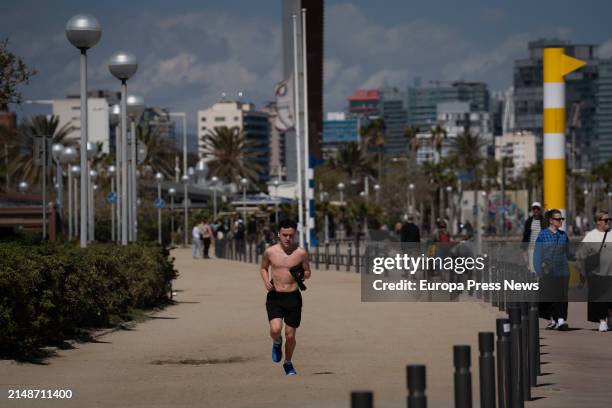 Man runs on the promenade of the Bogatell beach, on 15 April, 2024 in Barcelona, Catalonia, Spain. Catalonia has registered this April 13 and 14 a...