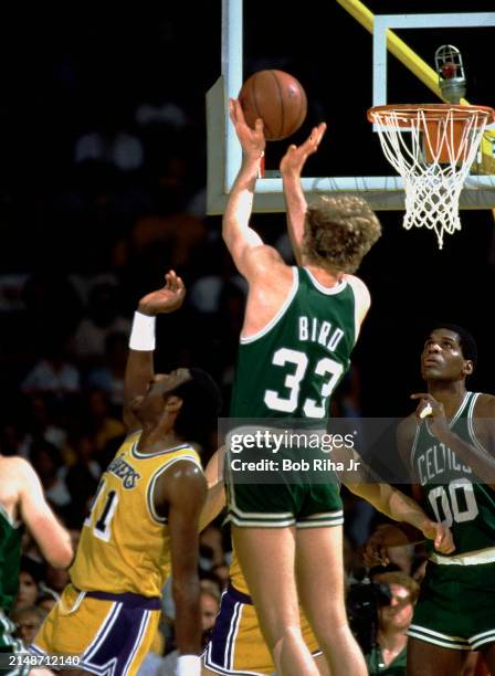 Boston Celtics Larry Bird gets rebound over Los Angeles Lakers Bob McAdoo during 1985 NBA Finals between Los Angeles Lakers and Boston Celtics, June...