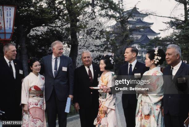 Massachusetts Governor John Volpe with other US Governors and Japanese women in traditional costume during a visit to Nagoya, Japan, April 8th 1968....