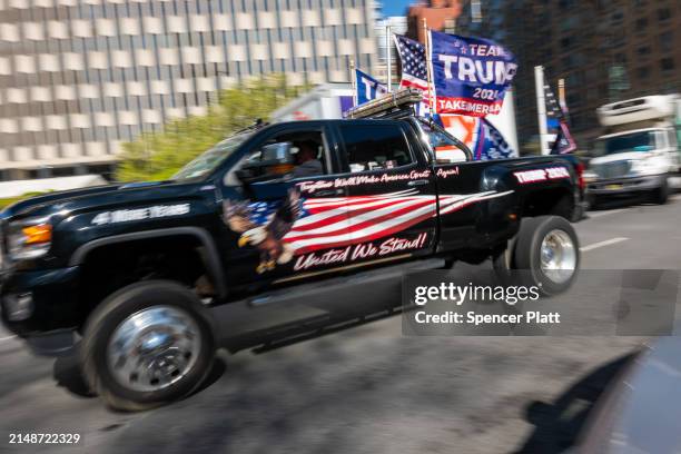 Supporters of Donald Trump gather outside of Manhattan Criminal Courthouse for the start of the first-ever criminal trial against a former president...