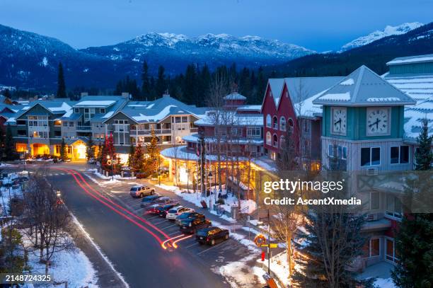 evening views of ski town in winter - ski resort stock pictures, royalty-free photos & images