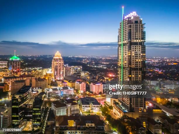sandton city centre cityscape at sunset - sandton stock pictures, royalty-free photos & images