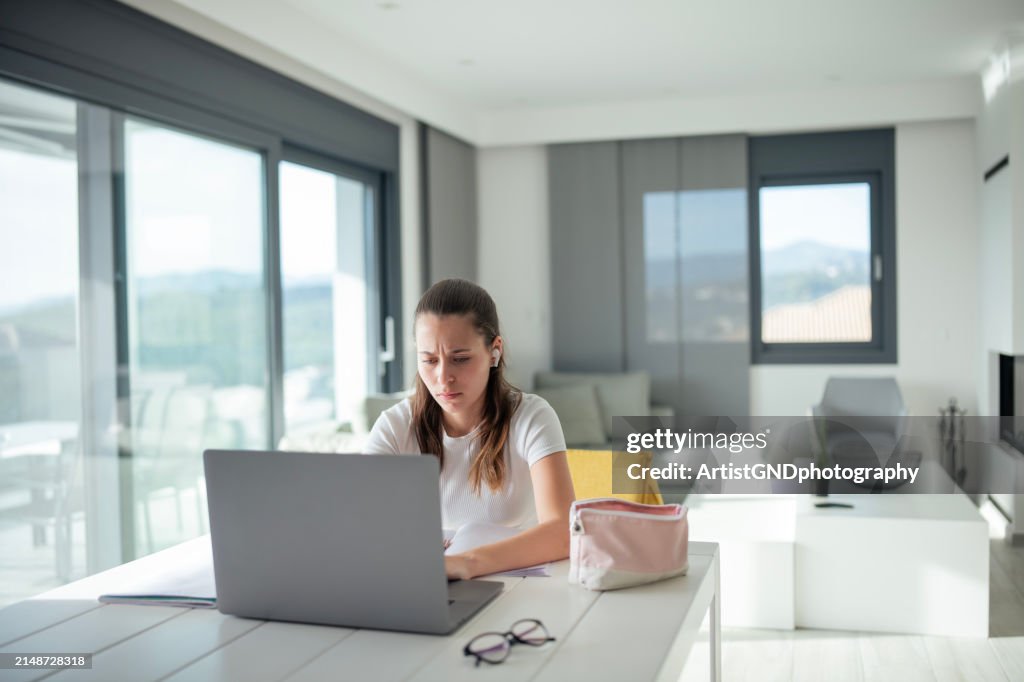 Doing Work Teenage Girl Doing School Work From Home High-Res Stock Photo - Getty ...