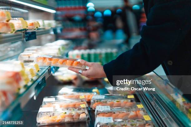 shopping ready to eat sushi at supermarket - ready to eat stock pictures, royalty-free photos & images