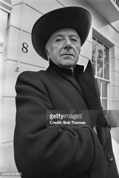 British fashion photographer, painter and interior designer Sir Cecil Beaton posed outside his residence, 8 Pelham Place in South Kensington, London...