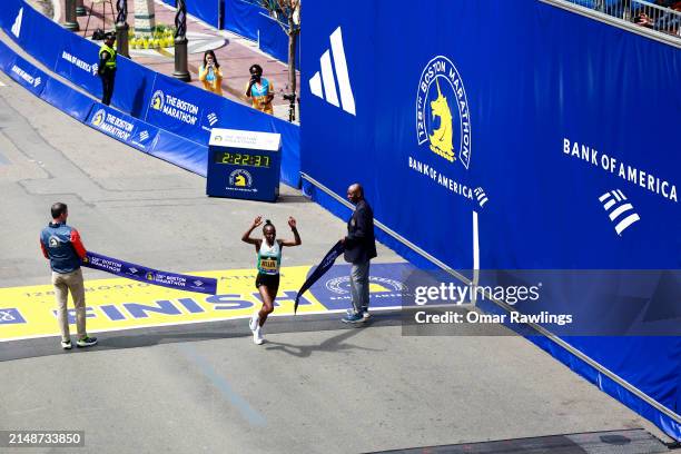 Hellen Obiri of Kenya crosses the finish line to win the Professional Women's Division during the 128th Boston Marathon on April 15, 2024 in Boston,...