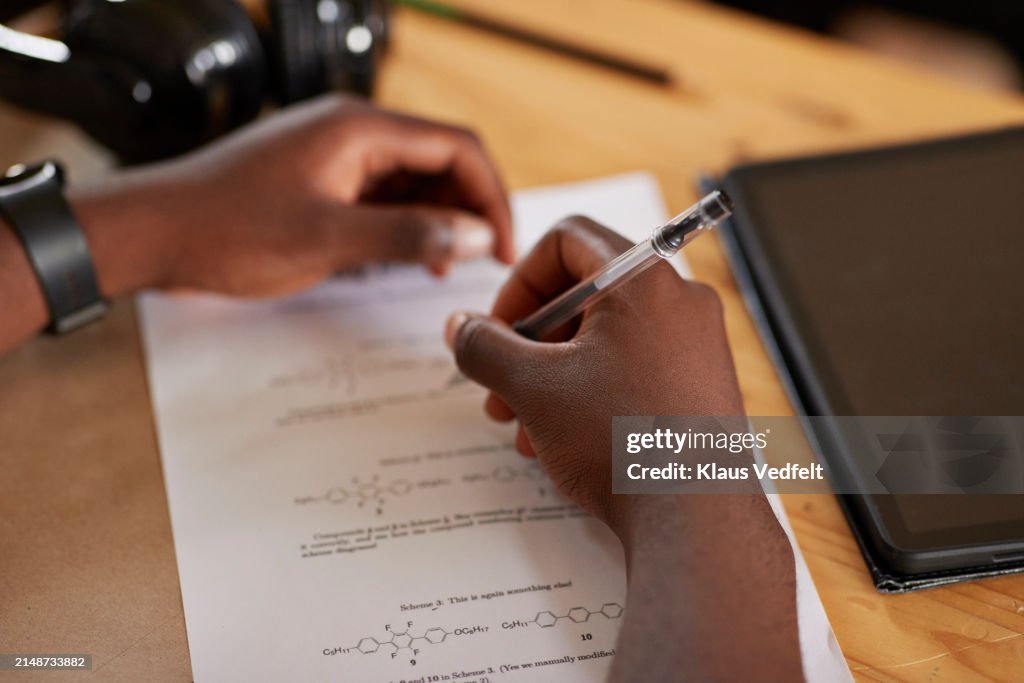 Students Using Paper Hands Of Male Teenage Student Writing On Paper During Exam High-Res ...