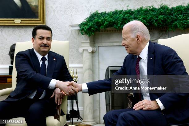 President Joe Biden and Iraqi Prime Minister Mohammed Shia al-Sudani shake hands in the Oval Office of the White House on April 15, 2024 in...