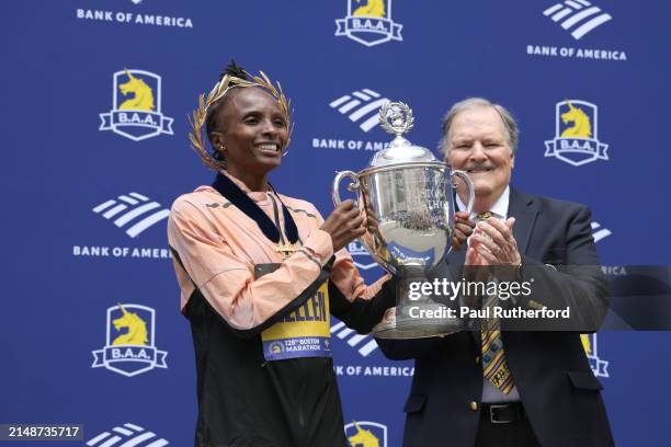 Hellen Obiri of Kenya poses with the trophy after winning the professional Women's Division during the 128th Boston Marathon on April 15, 2024 in...