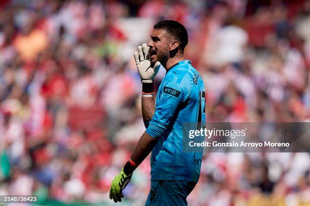 Goalkeeper Paulo Dino Gazzaniga of Girona FC shouts during the LaLiga EA Sports match between Atletico Madrid and Girona FC at Civitas Metropolitano...