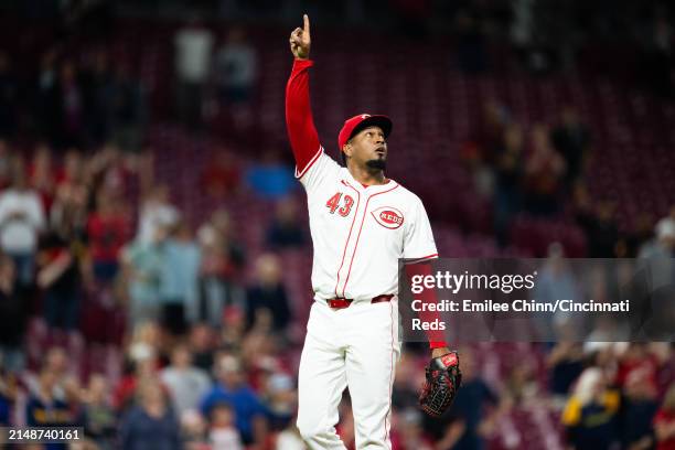 Alexis Diaz of the Cincinnati Reds calls a fly out during a game against the Milwaukee Brewers at Great American Ball Park on April 08, 2024 in...
