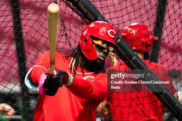 Elly De La Cruz of the Cincinnati Reds wears Solar Eclipse glasses during batting practice before a game against the Milwaukee Brewers at Great...