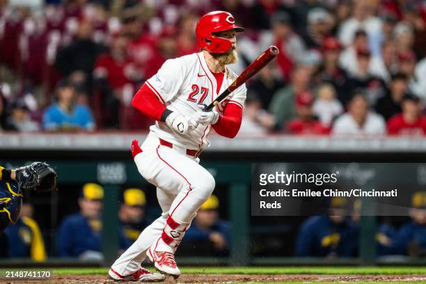 Jake Fraley of the Cincinnati Reds hits a double during a game against the Milwaukee Brewers at Great American Ball Park on April 09, 2024 in...