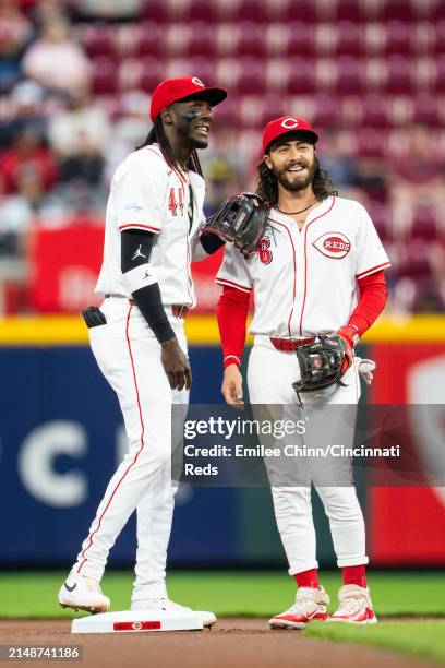 Elly De La Cruz of the Cincinnati Reds talks to Jonathan India during a game against the Milwaukee Brewers at Great American Ball Park on April 09,...