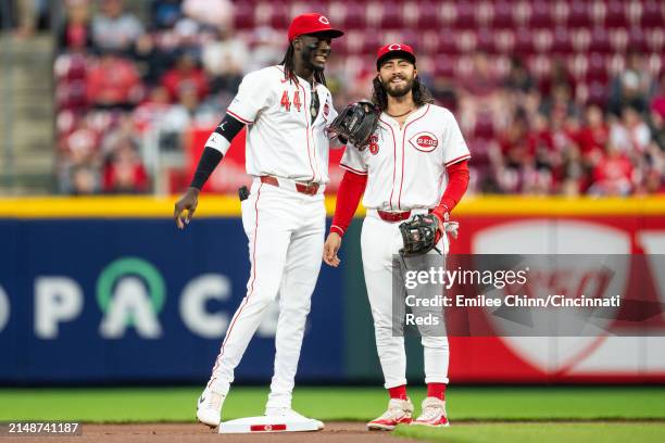 Elly De La Cruz of the Cincinnati Reds talks to Jonathan India during a game against the Milwaukee Brewers at Great American Ball Park on April 09,...