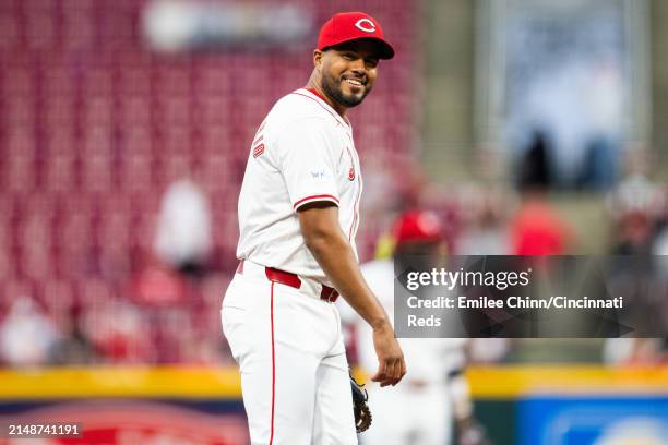 Jeimer Candelario of the Cincinnati Reds smiles during a game against the Milwaukee Brewers at Great American Ball Park on April 09, 2024 in...