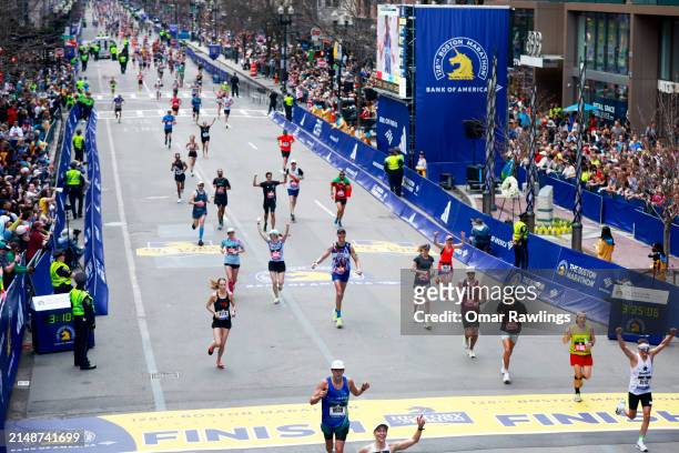 Former Boston Bruins NHL player Zdeno Chara looks on before he crosses the finish line of the 128th Boston Marathon on April 15, 2024 in Boston,...
