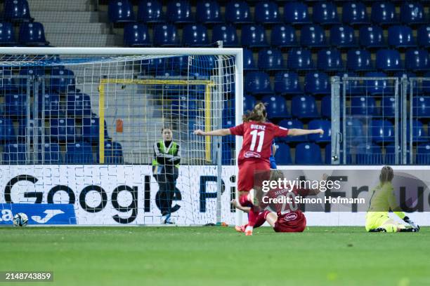 Meike Messmer of Köln celebrates her side's first goal with her team mates during the Google Pixel Women's Bundesliga match between TSG Hoffenheim v...