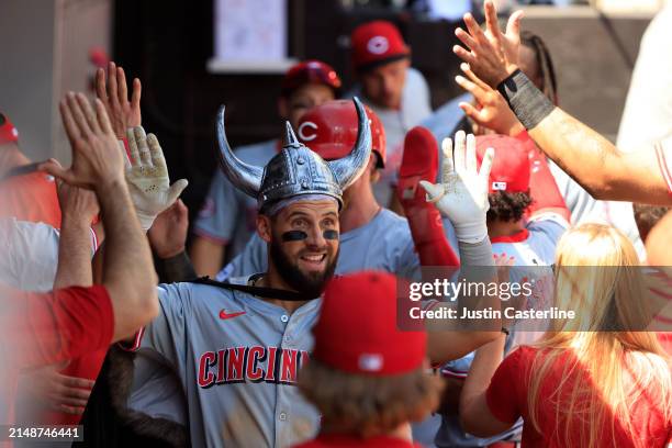 Nick Martini of the Cincinnati Reds celebrates a two run home run during the fifth inning in the game against the Chicago White Sox at Guaranteed...