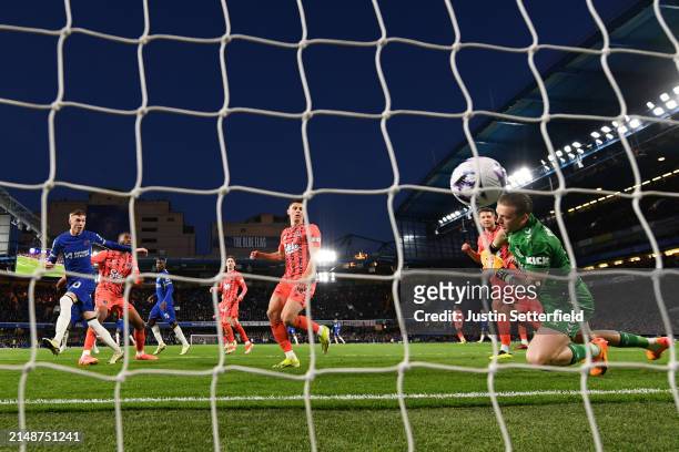 Cole Palmer of Chelsea scores his team's second goal past Jordan Pickford of Everton during the Premier League match between Chelsea FC and Everton...