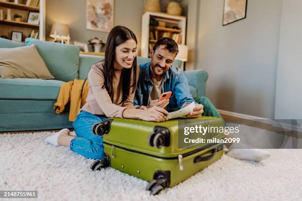 preparation for travel - koffer stockfoto's en -beelden