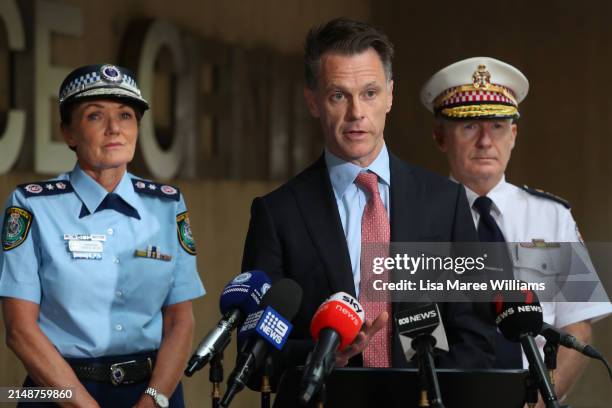 Premier of New South Wales Chris Minns , NSW Police Commissioner Karen Webb and Ambulance Commissioner Dominic Morgan speak during a press conference...