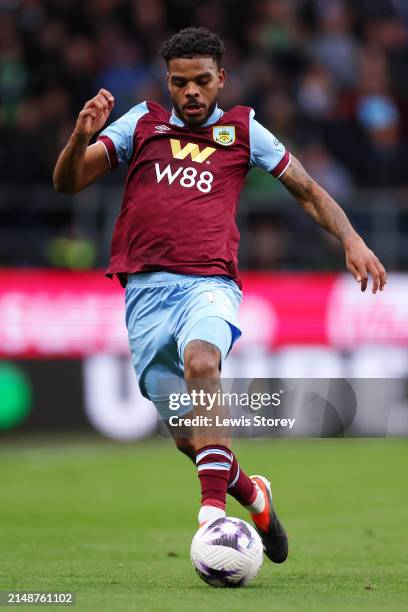 Lyle Foster of Burnley runs with the ball during the Premier League match between Burnley FC and Brighton & Hove Albion at Turf Moor on April 13,...