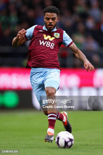 Lyle Foster of Burnley runs with the ball during the Premier League match between Burnley FC and Brighton & Hove Albion at Turf Moor on April 13,...