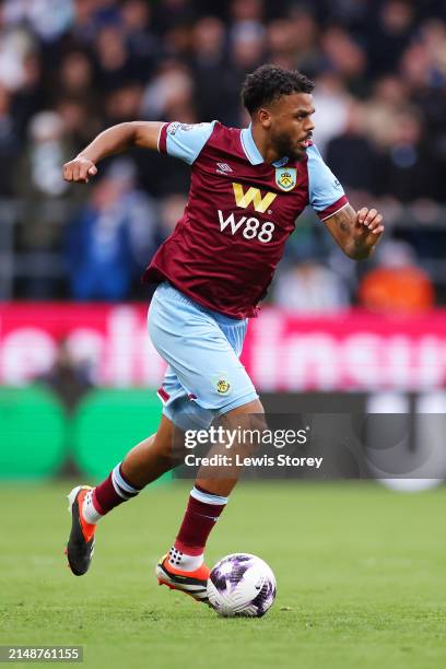 Lyle Foster of Burnley runs with the ball during the Premier League match between Burnley FC and Brighton & Hove Albion at Turf Moor on April 13,...