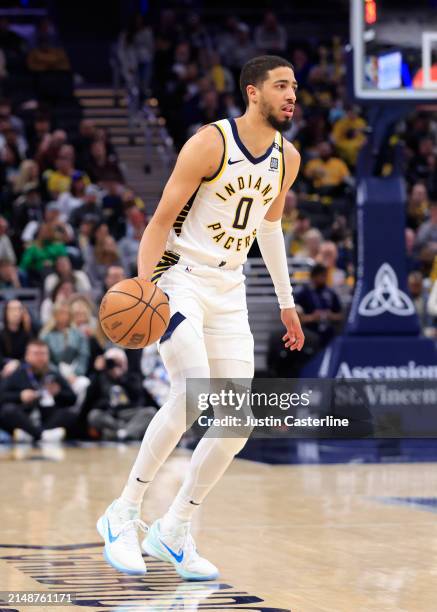 Tyrese Haliburton of the Indiana Pacers drives to the basket in the game against the Cleveland Cavaliers at Gainbridge Fieldhouse on March 18, 2024...
