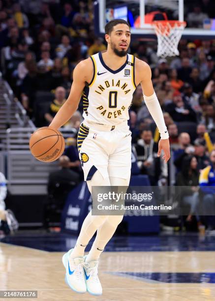 Tyrese Haliburton of the Indiana Pacers drives to the basket in the game against the Cleveland Cavaliers at Gainbridge Fieldhouse on March 18, 2024...