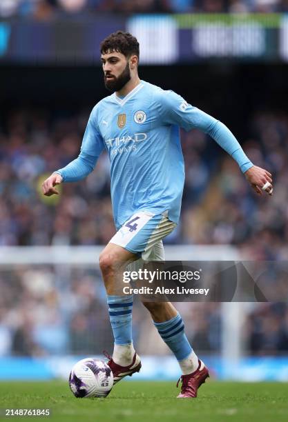 Josko Gvardiol of Manchester City during the Premier League match between Manchester City and Luton Town at Etihad Stadium on April 13, 2024 in...