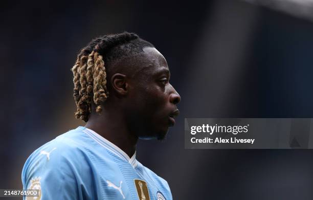 Jeremy Doku of Manchester City during the Premier League match between Manchester City and Luton Town at Etihad Stadium on April 13, 2024 in...