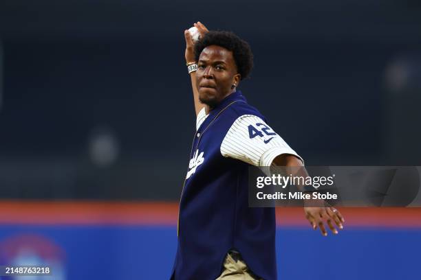 Busaro Robinson, Jackie Robinson's grandson, throws out the ceremonial first pitch on Jackie Robinson day prior to the game between the New York Mets...