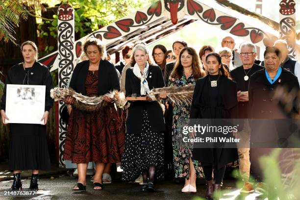 The delegation from the New Zealand Olympic Committee is welcomed with the Olympic kākahu onto the Tūrangawaewae Marae during the Paris 2024 New...