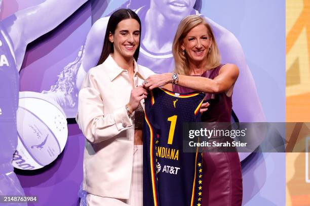 Caitlin Clark poses with WNBA Commissioner Cathy Engelbert after being selected first overall pick by the Indiana Fever during the 2024 WNBA Draft at...