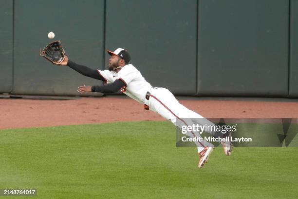 Cedric Mullins of the Baltimore Orioles catches a fly ball hit byByron Buxton if the Minnesota Twins in the first inning during a baseball game at...