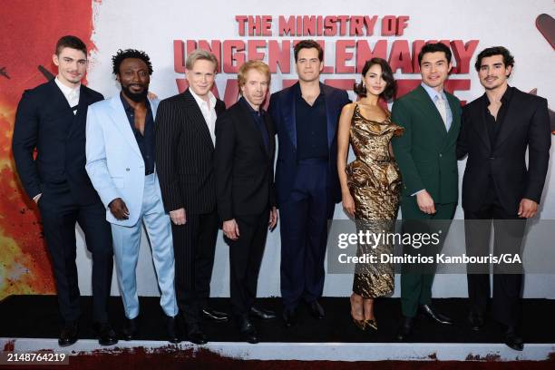 Hero Feinnes Tiffin, Babs Olusanmokun, Cary Elwes, Jerry Bruckheimer, Henry Cavill, Eiza González Rivera, Henry Golding and Henry Zaga attend the...