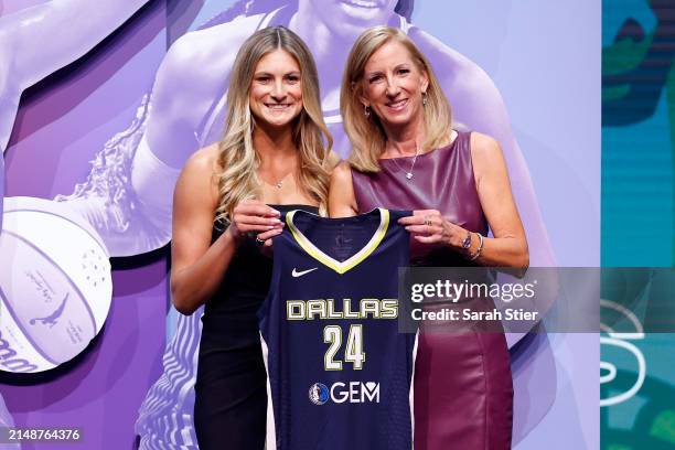 Jacy Sheldon poses with WNBA Commissioner Cathy Engelbert after being selected fifth overall pick by the Dallas Wings during the 2024 WNBA Draft at...