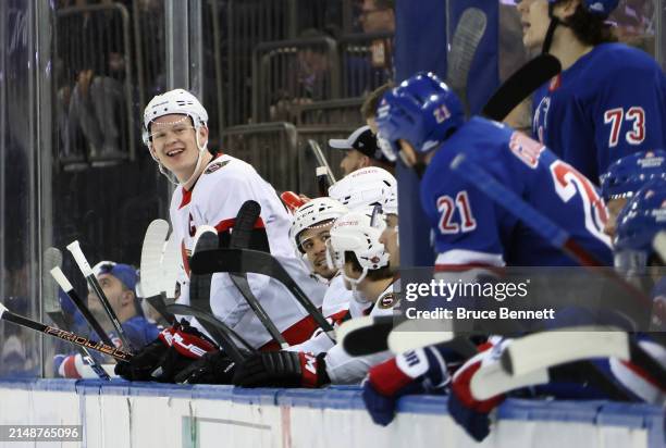 Brady Tkachuk of the Ottawa Senators and Barclay Goodrow of the New York Rangers chat during the first period at Madison Square Garden on April 15,...