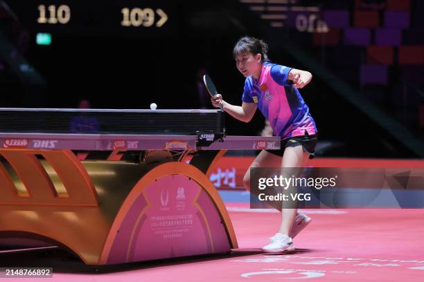 Chen Xingtong of China competes in the Women's Singles group match against Liu Hsing-Yin of Chinese Taipei on day one of ITTF Men's and Women's World...