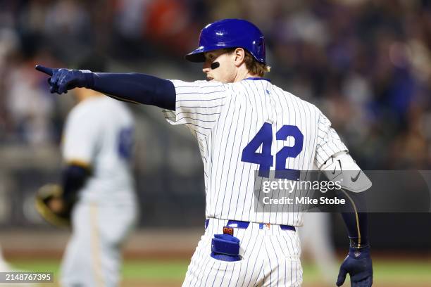 Brett Baty of the New York Mets points to the dugout after hitting a single in the sixth inning against the Pittsburgh Pirates at Citi Field on April...