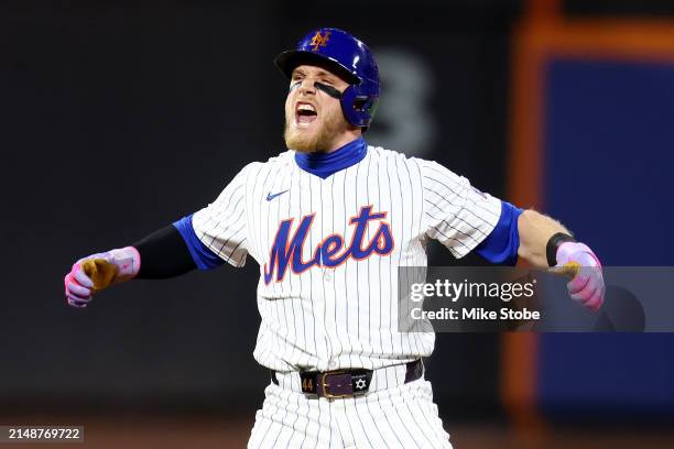 Harrison Bader of the New York Mets celebrates after hitting a a 2-run double to left field in the eighth inning against the Pittsburgh Pirates at...