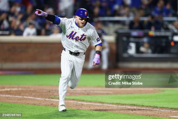 Harrison Bader of the New York Mets celebrates after hitting a a 2-run double to left field in the eighth inning against the Pittsburgh Pirates at...