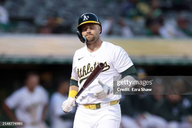 Seth Brown of the Oakland Athletics reacts after striking out against the St. Louis Cardinals to end the fourth inning at Oakland Coliseum on April...