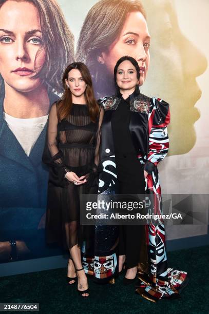 Riley Keough and Lily Gladstone attend the premiere of Hulu's "Under The Bridge" at DGA Theater Complex on April 15, 2024 in Los Angeles, California.